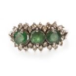 A GREEN GEM SET AND DIAMOND CLUSTER RING