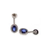 A PAIR OF SAPPHIRE AND DIAMOND EARRINGS