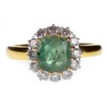 AN EMERALD AND DIAMOND RING