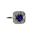 A SAPPHIRE AND DIAMOND RING