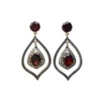 A PAIR OF GOLD PLATED GARNET AND DIAMOND EARRINGS