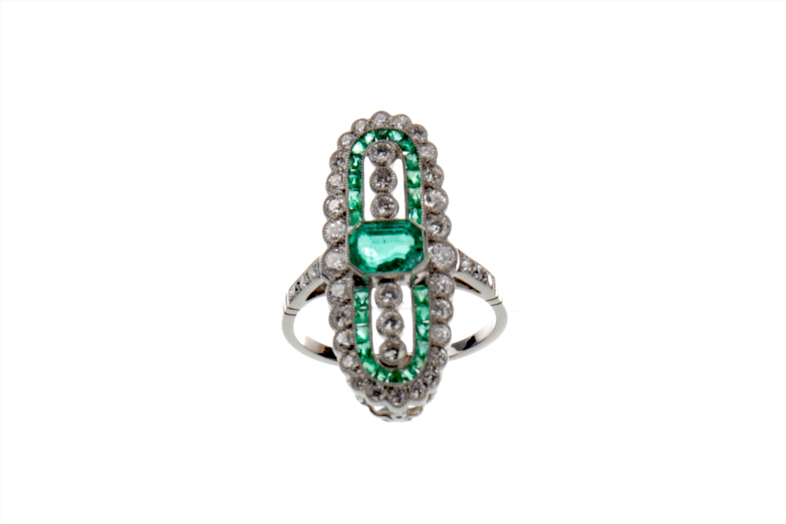 AN EMERALD AND DIAMOND RING