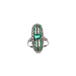 AN EMERALD AND DIAMOND RING