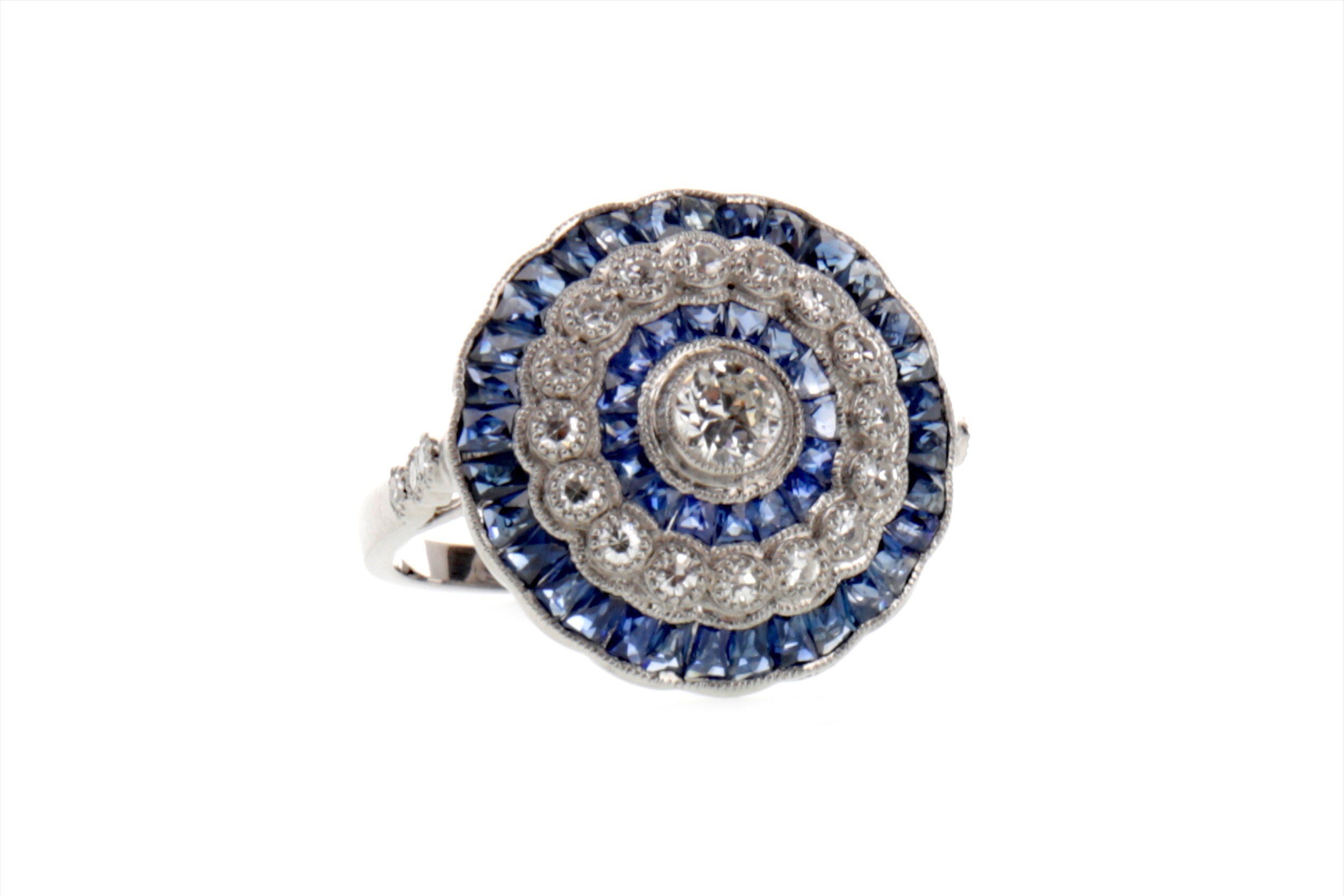 A SAPPHIRE AND DIAMOND RING