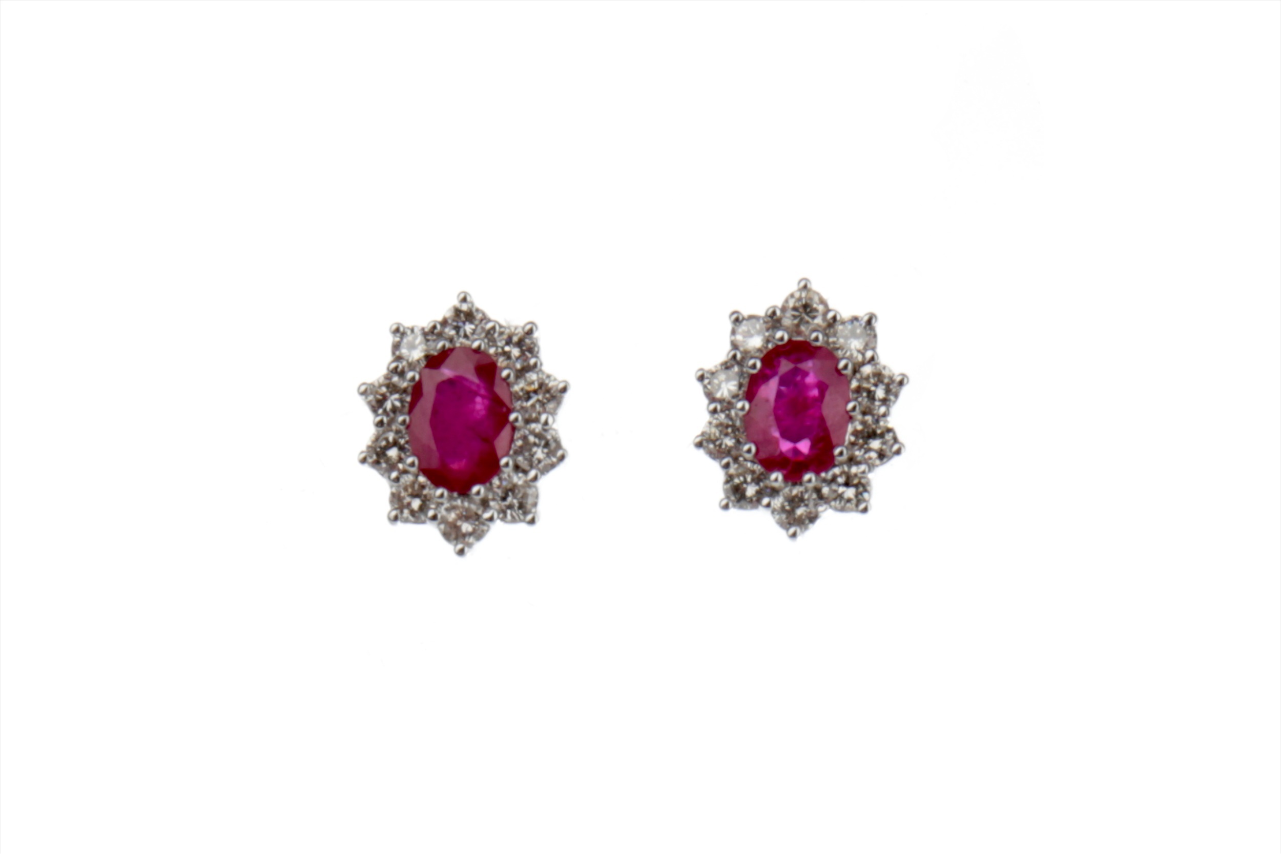 A PAIR OF RUBY AND DIAMOND EARRINGS