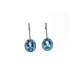 A PAIR OF TOPAZ AND DIAMOND EARRINGS