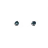 A PAIR OF BLUE ZIRCON STUD EARRINGS