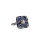 A SAPPHIRE AND DIAMOND RING