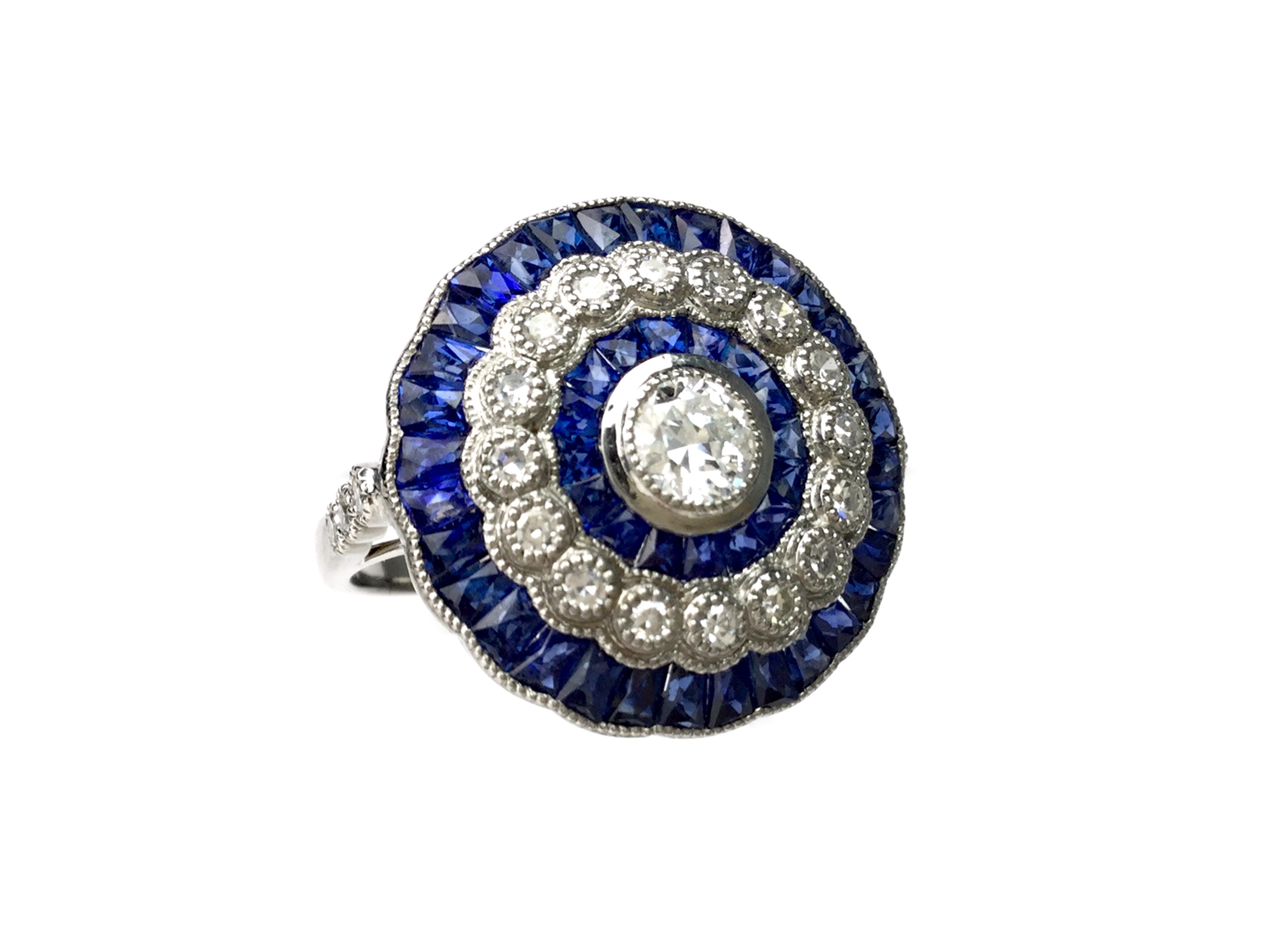 A SAPPHIRE AND DIAMOND RING