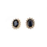 A PAIR OF SAPPHIRE AND DIAMOND EARRINGS