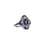 A SAPPHIRE AND DIAMOND RING