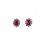 A PAIR OF RUBY AND DIAMOND EARRINGS