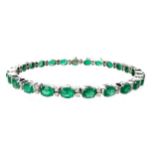 AN EMERALD AND DIAMOND BRACELET