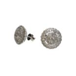 A PAIR OF DIAMOND CLUSTER EARRINGS