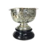 AN EMBOSSED EDWARDIAN SILVER BOWL