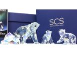 A SWAROVSKI CRYSTAL FIGURE OF A SIKU POLAR BEAR ALONG WITH A PAIR OF CUBS