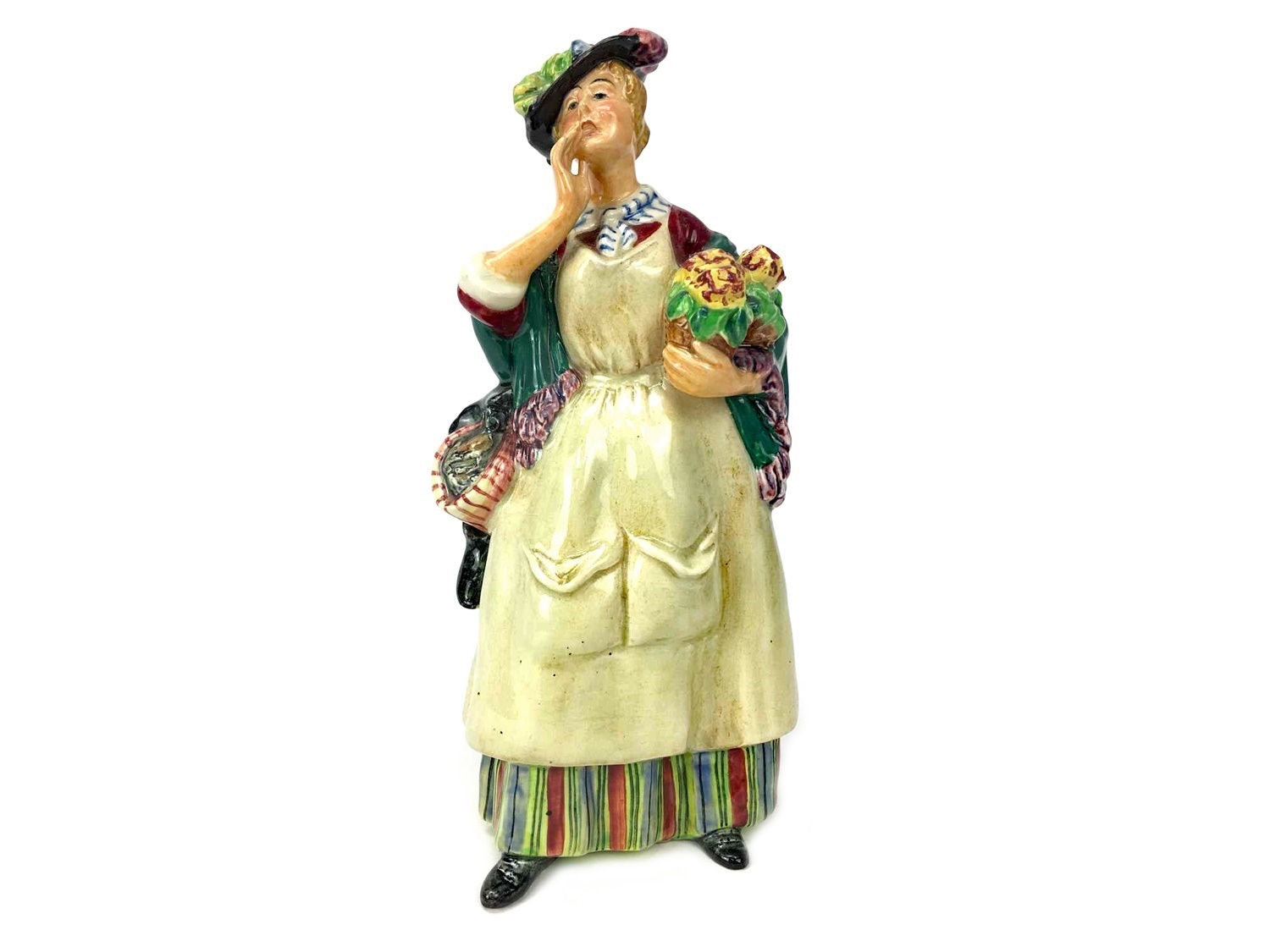 A ROYAL DOULTON FIGURE OF ODDS & ENDS