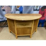 A MODERNIST DINING TABLE AND SIDEBOARD