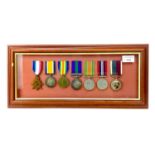 A FRAMED WORLD WAR MEDAL GROUP RELATING TO THE LOGUE FAMILY