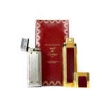 A MUST DE CARTIER PERFUME ATOMISER AND CARTIER LIGHTER