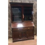 AN EARLY 20TH CENTURY MAHOGANY BUREAU BOOKCASE