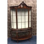 A MAHOGANY BOW FRONT DISPLAY CABINETOF CHIPPENDALE DESIGN