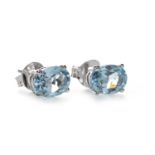 A PAIR OF BLUE TOPAZ STUD EARRINGS