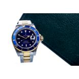 A GENTLEMAN'S ROLEX OYSTER PERPETUAL DATE SUBMARINER STAINLESS STEEL BI COLOUR AUTOMATIC WRIST WATCH