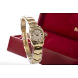 A LADY'S ROLEX OYSTER PERPETUAL EIGHTEEN CARAT GOLD AUTOMATIC WRIST WATCH GOLD WATCH