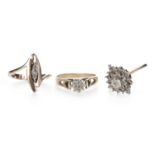 TWO DIAMOND RINGS AND A WHITE GEM SET RING