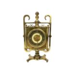 A MID-20TH CENTURY BRASS CASED MANTEL CLOCK