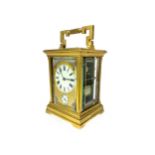 A VICTORIAN GILTMETAL CARRIAGE CLOCK