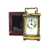 AN EARLY 20TH CENTURY BRASS CARRIAGE CLOCK