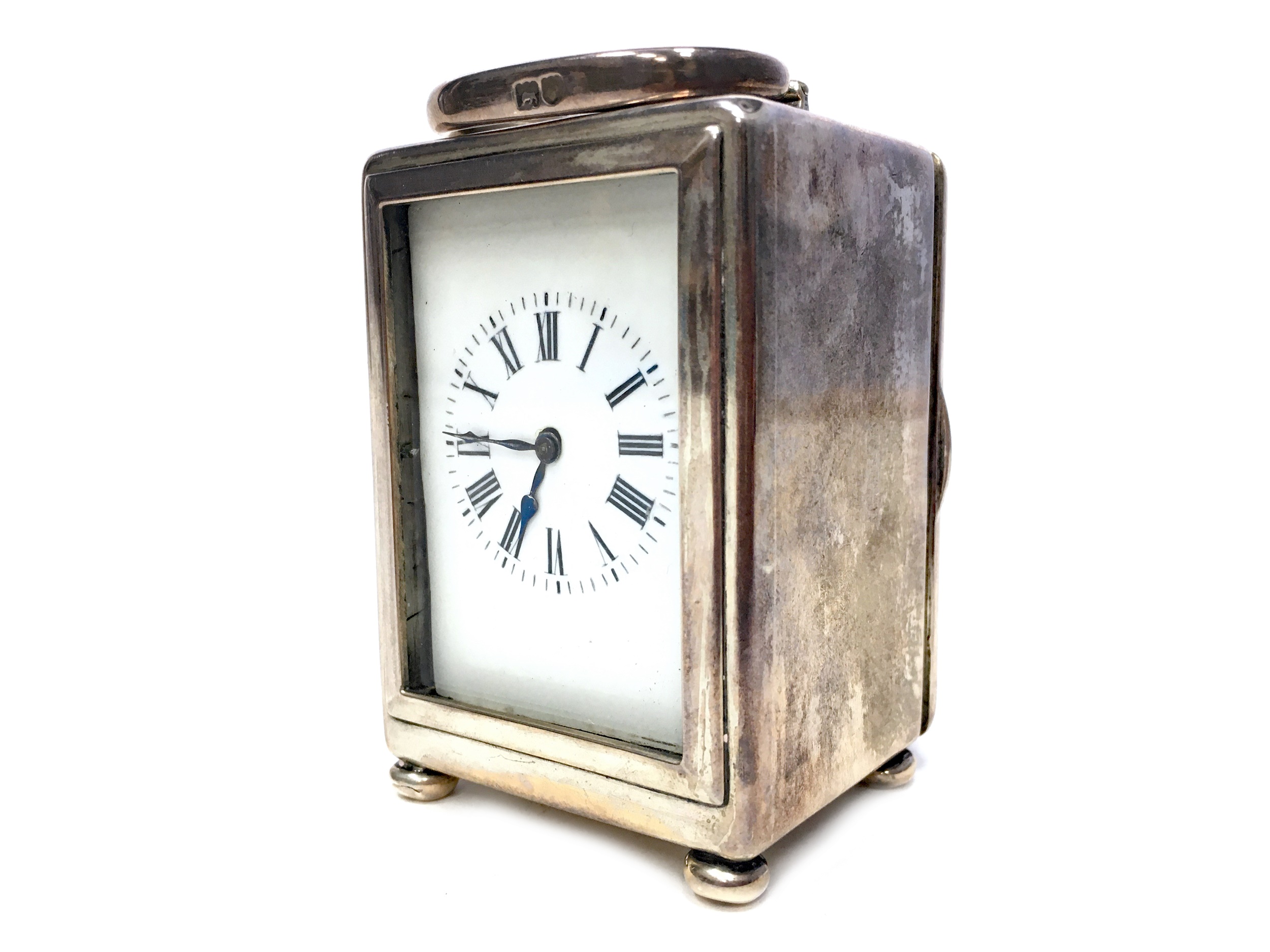 AN EARLY 20TH CENTURY SILVER CASED MINIATURE CARRIAGE CLOCK