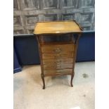 AN EDWARDIAN MAHOGANY SHERATON REVIVAL MUSIC CABINET