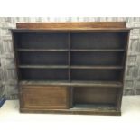 A LATE VICTORIAN STAINED PINE OPEN BOOKCASE