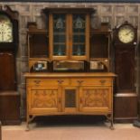 AN IMPRESSIVE ARTS & CRAFTS OAK SIDEBOARD