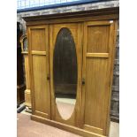 AN EARLY 20TH CENTURY INLAID MAHOGANY THREE DOOR WARDROBE