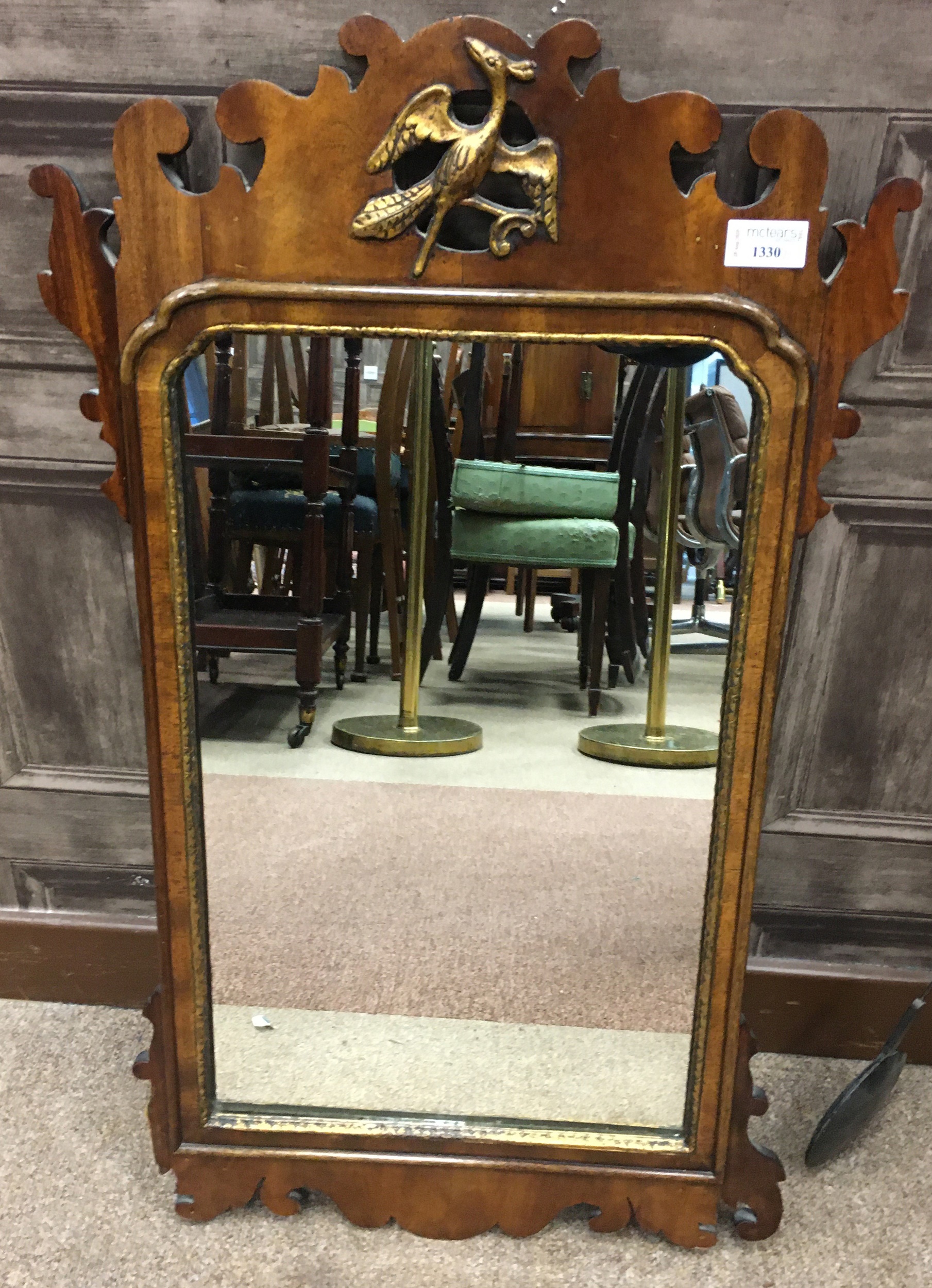 AN UPRIGHT WALL MIRROR OF GEORGE III DESIGN AND ANOTHER