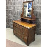 A LATE VICTORIAN OAK WARDROBE AND A SIMILAR DRESSING CHEST