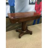 A WILLIAM IV MAHOGANY TURNOVER TABLE