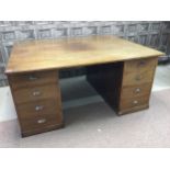 A 20TH CENTURY OAK PEDESTAL WRITING DESK