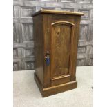 A 20TH CENTURY OAK BEDSIDE CABINET