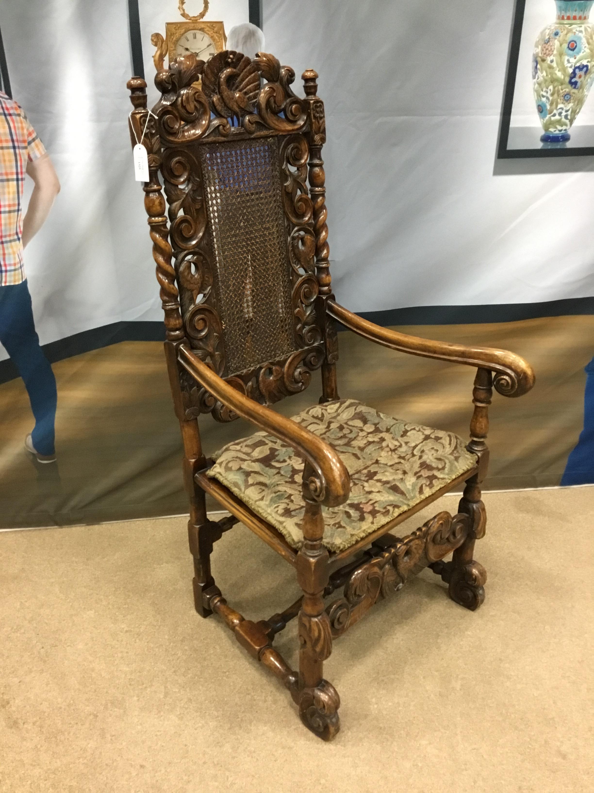 A WALNUT ARM CHAIR OF CHARLES I DESIGN