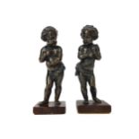A PAIR OF 19TH CENTURY BRONZE FIGURES OF PUTTI