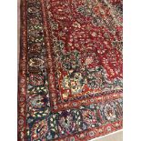 A PERSIAN MASHAD RUG