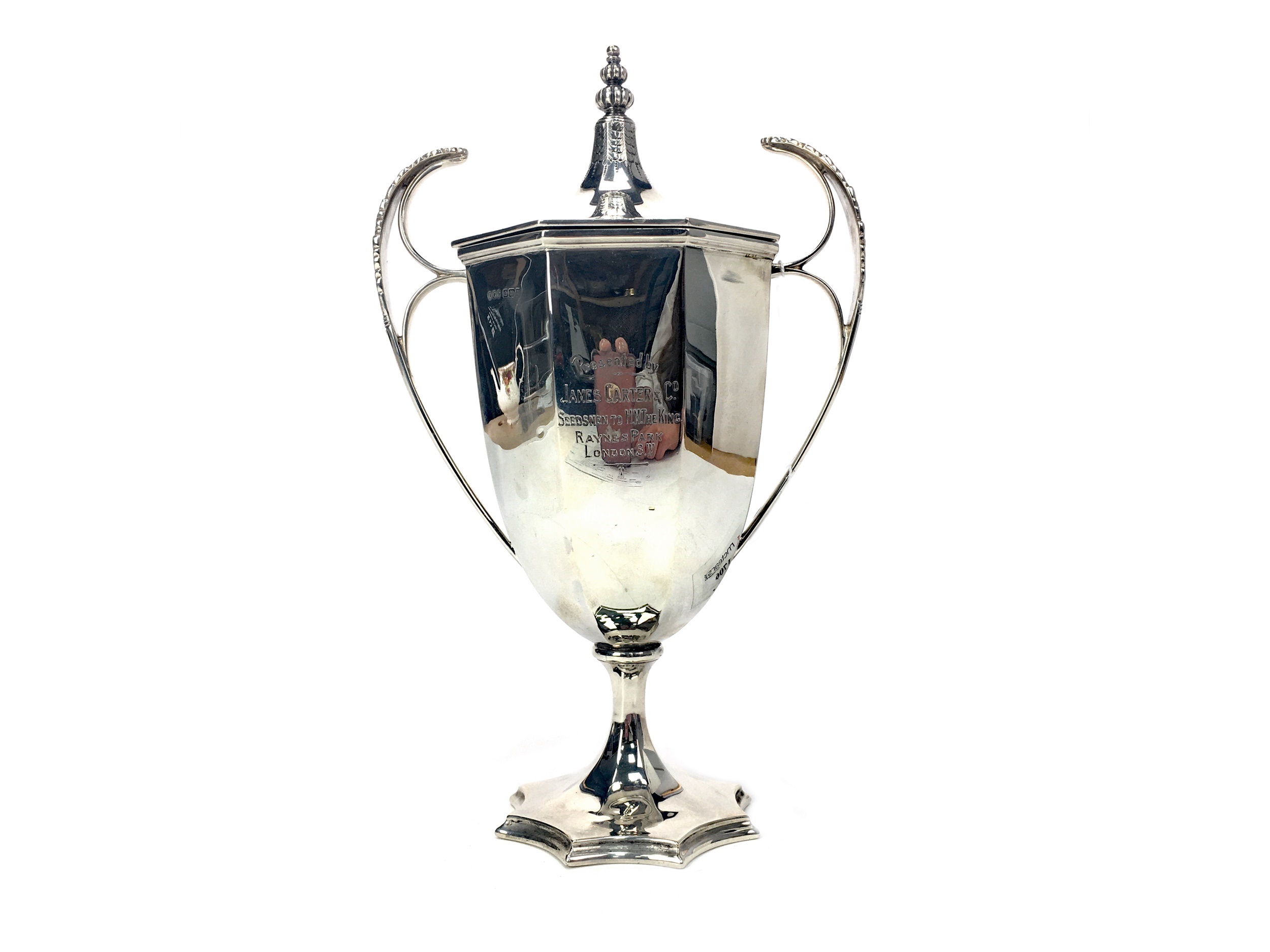 AN EARLY 20TH CENTURY SILVER TROPHY CUP AND COVER