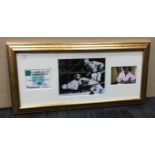 A FRAMED AUTOGRAPHED PHOTOGRAPH OF RUBIN 'HURRICANE' CARTER