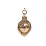 AN EARLY 20TH CENTURY NINE CARAT GOLD FOB MEDAL