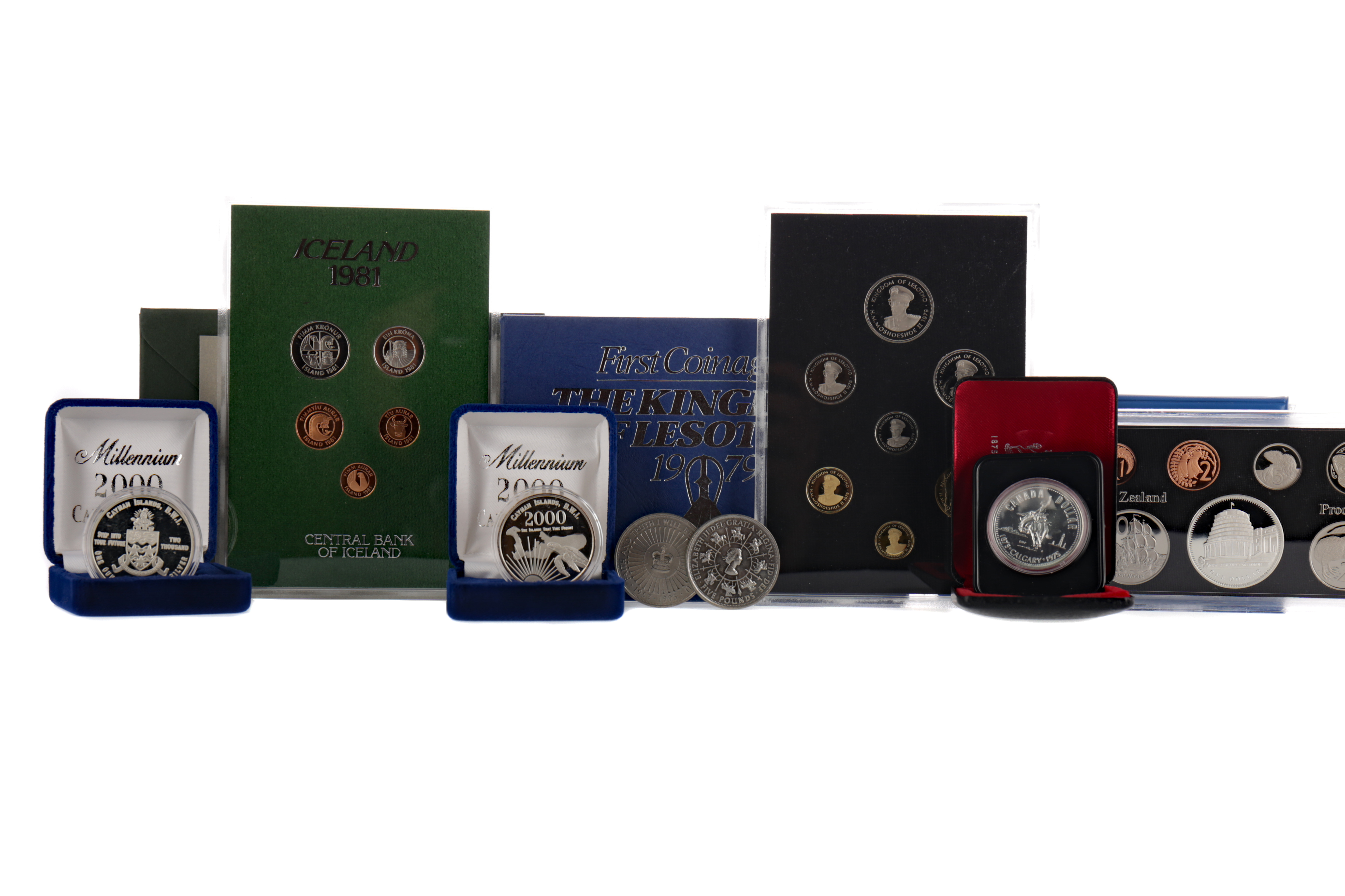 A COLLECTION OF WORLD PROOF COIN SETS